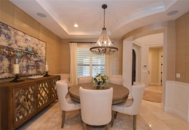 Nestled on the golf course & water in Parkland Golf & Country on Parkland Golf Club in Florida - for sale on GolfHomes.com, golf home, golf lot