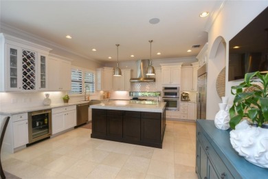 Nestled on the golf course & water in Parkland Golf & Country on Parkland Golf Club in Florida - for sale on GolfHomes.com, golf home, golf lot