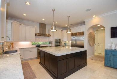 Nestled on the golf course & water in Parkland Golf & Country on Parkland Golf Club in Florida - for sale on GolfHomes.com, golf home, golf lot