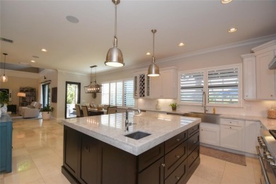 Nestled on the golf course & water in Parkland Golf & Country on Parkland Golf Club in Florida - for sale on GolfHomes.com, golf home, golf lot