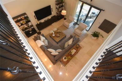 Nestled on the golf course & water in Parkland Golf & Country on Parkland Golf Club in Florida - for sale on GolfHomes.com, golf home, golf lot