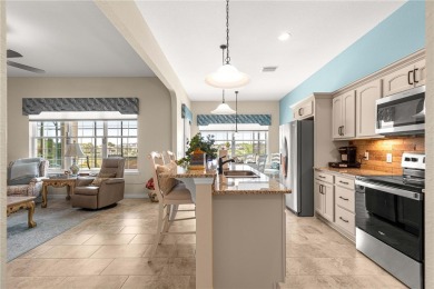Absolutely stunning POOL home with an outstanding water view on Stonecrest Golf and Club Club in Florida - for sale on GolfHomes.com, golf home, golf lot