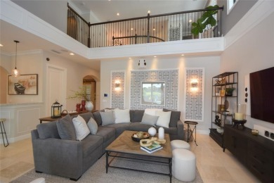Nestled on the golf course & water in Parkland Golf & Country on Parkland Golf Club in Florida - for sale on GolfHomes.com, golf home, golf lot