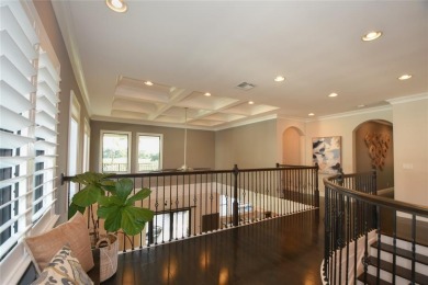 Nestled on the golf course & water in Parkland Golf & Country on Parkland Golf Club in Florida - for sale on GolfHomes.com, golf home, golf lot