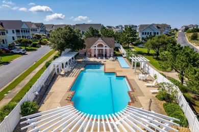 This 4-bedroom, 3-bathroom vacation home in The Currituck Club's on The Currituck Golf Club in North Carolina - for sale on GolfHomes.com, golf home, golf lot