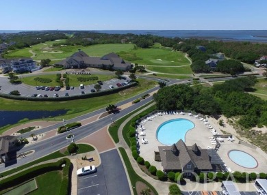 This 4-bedroom, 3-bathroom vacation home in The Currituck Club's on The Currituck Golf Club in North Carolina - for sale on GolfHomes.com, golf home, golf lot