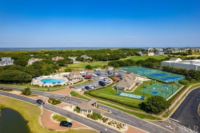 This 4-bedroom, 3-bathroom vacation home in The Currituck Club's on The Currituck Golf Club in North Carolina - for sale on GolfHomes.com, golf home, golf lot