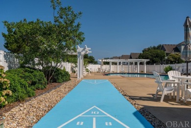 This 4-bedroom, 3-bathroom vacation home in The Currituck Club's on The Currituck Golf Club in North Carolina - for sale on GolfHomes.com, golf home, golf lot