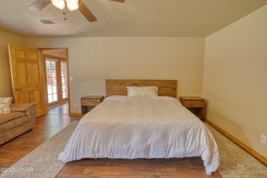 This perfect, cozy cabin is surrounded by Ponderosa Pines and on Pinetop Lakes Golf and Country Club in Arizona - for sale on GolfHomes.com, golf home, golf lot