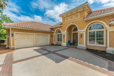 Luxurious family living all on one level in the esteemed gated on Regatta Bay Golf and Country Club in Florida - for sale on GolfHomes.com, golf home, golf lot