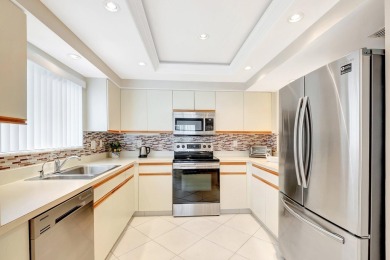 WELCOME TO THIS STUNNING 2 BEDROOM PLUS DEN, 2 BATH CONDO on Gleneagles Golf and Country Club in Florida - for sale on GolfHomes.com, golf home, golf lot