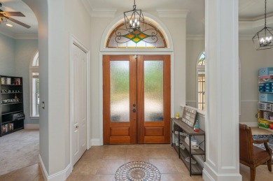 Luxurious family living all on one level in the esteemed gated on Regatta Bay Golf and Country Club in Florida - for sale on GolfHomes.com, golf home, golf lot