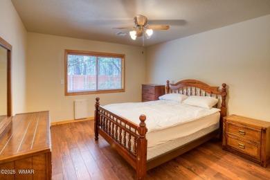 This perfect, cozy cabin is surrounded by Ponderosa Pines and on Pinetop Lakes Golf and Country Club in Arizona - for sale on GolfHomes.com, golf home, golf lot