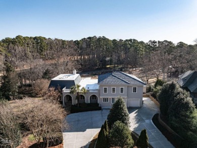 Welcome to 101 Rutherglen a Spanish-inspired villa that is a on MacGregor Downs Country Club in North Carolina - for sale on GolfHomes.com, golf home, golf lot