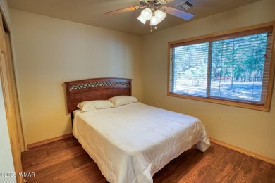 This perfect, cozy cabin is surrounded by Ponderosa Pines and on Pinetop Lakes Golf and Country Club in Arizona - for sale on GolfHomes.com, golf home, golf lot