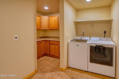 This perfect, cozy cabin is surrounded by Ponderosa Pines and on Pinetop Lakes Golf and Country Club in Arizona - for sale on GolfHomes.com, golf home, golf lot