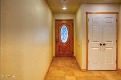 This perfect, cozy cabin is surrounded by Ponderosa Pines and on Pinetop Lakes Golf and Country Club in Arizona - for sale on GolfHomes.com, golf home, golf lot