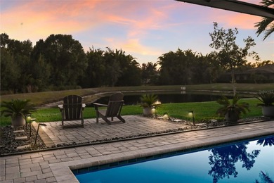 Prepare to be impressed by this STUNNING pool home on a on Links At Greenfield Plantation in Florida - for sale on GolfHomes.com, golf home, golf lot