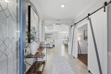 Prepare to be impressed by this STUNNING pool home on a on Links At Greenfield Plantation in Florida - for sale on GolfHomes.com, golf home, golf lot