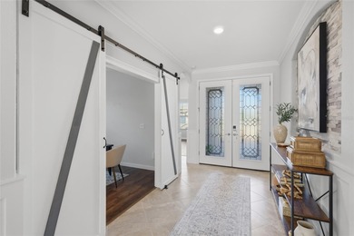 Prepare to be impressed by this STUNNING pool home on a on Links At Greenfield Plantation in Florida - for sale on GolfHomes.com, golf home, golf lot