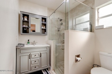 Charming 3-Bedroom Home with Pond Views & Golf Course Access
 on Riviera Country Club in Florida - for sale on GolfHomes.com, golf home, golf lot