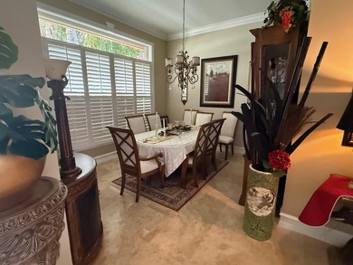 CUSTOM-BUILT POOL HOME OVERLOOKING THE 11TH HOLE IN SOUGHT-AFTER on St. Lucie Trail Golf Club in Florida - for sale on GolfHomes.com, golf home, golf lot