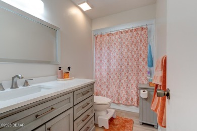 Charming 3-Bedroom Home with Pond Views & Golf Course Access
 on Riviera Country Club in Florida - for sale on GolfHomes.com, golf home, golf lot