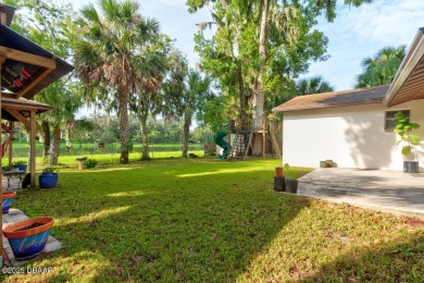 Charming 3-Bedroom Home with Pond Views & Golf Course Access
 on Riviera Country Club in Florida - for sale on GolfHomes.com, golf home, golf lot