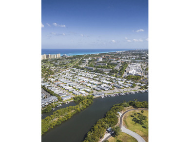 NEW ROOF coming soon! Hurricane rated architectural asphalt roof on Jupiter Dunes Golf Course in Florida - for sale on GolfHomes.com, golf home, golf lot