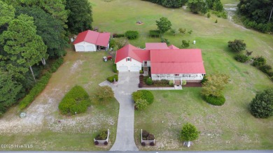 Welcome to 497 Hardison Drive in the heart of Lake Minnesott on Minnesott Golf and Country Club in North Carolina - for sale on GolfHomes.com, golf home, golf lot
