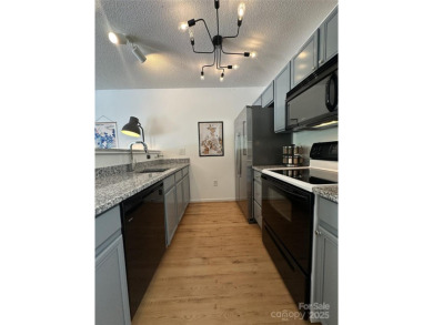 Discover this delightful fully furnished end-unit home on Lenoir Golf Club in North Carolina - for sale on GolfHomes.com, golf home, golf lot