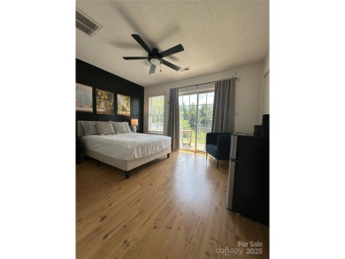 Discover this delightful fully furnished end-unit home on Lenoir Golf Club in North Carolina - for sale on GolfHomes.com, golf home, golf lot