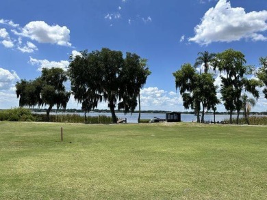 MOTIVATED SELLER ~ NEW REDUCED PRICE! Nestled on the Chain of on Four Lakes Golf Club in Florida - for sale on GolfHomes.com, golf home, golf lot