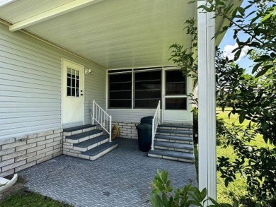 MOTIVATED SELLER ~ NEW REDUCED PRICE! Nestled on the Chain of on Four Lakes Golf Club in Florida - for sale on GolfHomes.com, golf home, golf lot