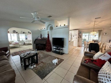 MOTIVATED SELLER ~ NEW REDUCED PRICE! Nestled on the Chain of on Four Lakes Golf Club in Florida - for sale on GolfHomes.com, golf home, golf lot