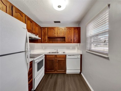 Live the relaxed Florida lifestyle in this desirable 1st floor on Vero Beach South Golf Course in Florida - for sale on GolfHomes.com, golf home, golf lot
