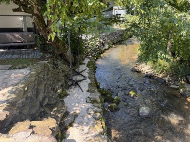 Absolutely beautiful and VERY RARE VACANT CREEK lot in the on Bent Creek Golf Course in Tennessee - for sale on GolfHomes.com, golf home, golf lot