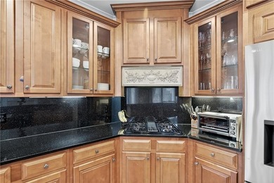 This stunning home in the prestigious gated with security guard on Whitewater Creek in Georgia - for sale on GolfHomes.com, golf home, golf lot