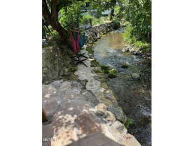 Absolutely beautiful and VERY RARE VACANT CREEK lot in the on Bent Creek Golf Course in Tennessee - for sale on GolfHomes.com, golf home, golf lot