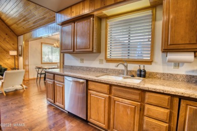 This cozy furnished A-frame cabin in Pinetop Lakes with Rec on Pinetop Lakes Golf and Country Club in Arizona - for sale on GolfHomes.com, golf home, golf lot