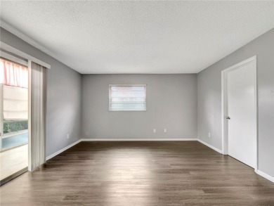 Live the relaxed Florida lifestyle in this desirable 1st floor on Vero Beach South Golf Course in Florida - for sale on GolfHomes.com, golf home, golf lot