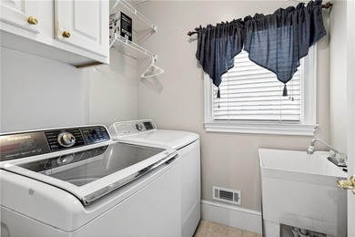 This stunning home in the prestigious gated with security guard on Whitewater Creek in Georgia - for sale on GolfHomes.com, golf home, golf lot