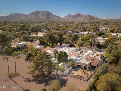 This exceptional home, located adjacent to Camelback Country on Camelback Golf Club in Arizona - for sale on GolfHomes.com, golf home, golf lot
