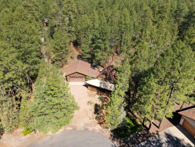 This cozy furnished A-frame cabin in Pinetop Lakes with Rec on Pinetop Lakes Golf and Country Club in Arizona - for sale on GolfHomes.com, golf home, golf lot