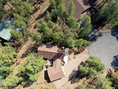 This cozy furnished A-frame cabin in Pinetop Lakes with Rec on Pinetop Lakes Golf and Country Club in Arizona - for sale on GolfHomes.com, golf home, golf lot