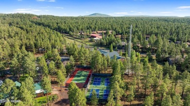 This cozy furnished A-frame cabin in Pinetop Lakes with Rec on Pinetop Lakes Golf and Country Club in Arizona - for sale on GolfHomes.com, golf home, golf lot