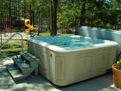 This cozy furnished A-frame cabin in Pinetop Lakes with Rec on Pinetop Lakes Golf and Country Club in Arizona - for sale on GolfHomes.com, golf home, golf lot