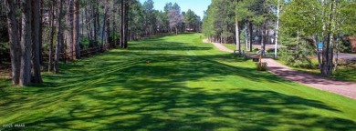 This cozy furnished A-frame cabin in Pinetop Lakes with Rec on Pinetop Lakes Golf and Country Club in Arizona - for sale on GolfHomes.com, golf home, golf lot