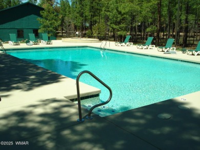 This cozy furnished A-frame cabin in Pinetop Lakes with Rec on Pinetop Lakes Golf and Country Club in Arizona - for sale on GolfHomes.com, golf home, golf lot