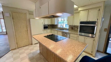 Seller says ,,,,,Get it sold!!!!  New kitchen vinyl plank on Water Oak Country Club Estates in Florida - for sale on GolfHomes.com, golf home, golf lot